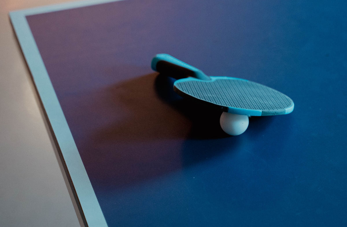 Table tennis paddle and ball